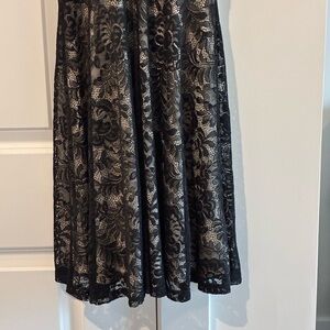 Elegant Black Floral Lace Midi Skirt with Nude Lining